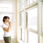 Woman Looking Out the Window